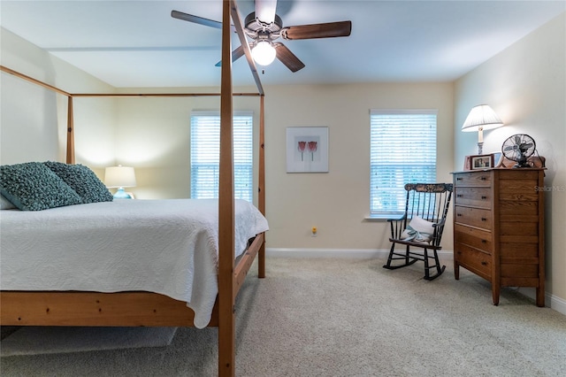 bedroom with ceiling fan and carpet floors