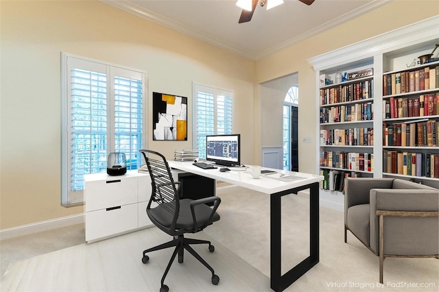 7108 NW 41st Ln, Gainesville, FL 32606 - home office featuring crown molding, light colored carpet, ceiling fan, and baseboards