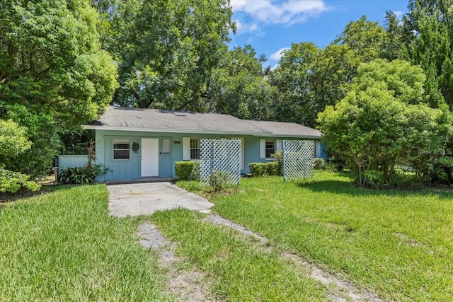 ranch-style house with a front yard