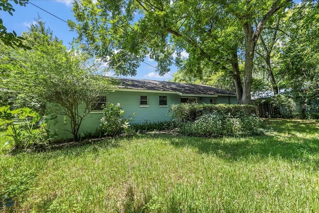 exterior space featuring a yard