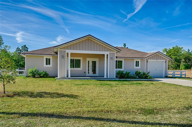 ranch-style house with a front lawn and a garage