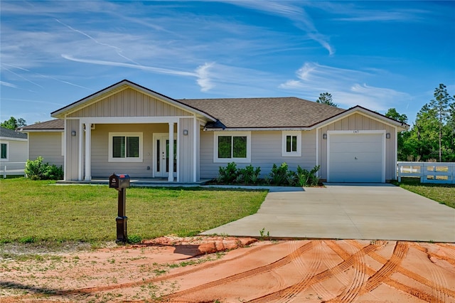 ranch-style house with a garage and a front lawn