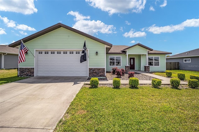 single story home with a front yard and a garage