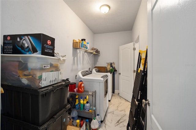 laundry room with washer and clothes dryer, washer hookup, and light tile floors