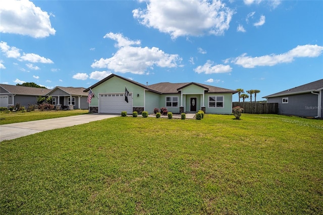 ranch-style home with a front yard and a garage