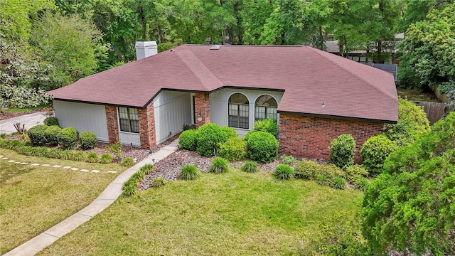 view of front of home with a front yard