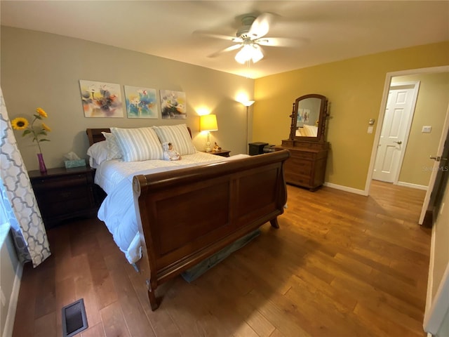 bedroom featuring ceiling fan and wood-type flooring