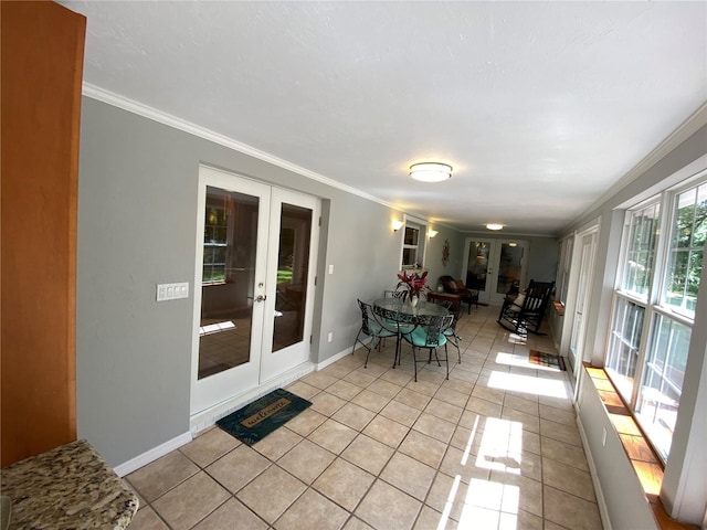 unfurnished sunroom with french doors