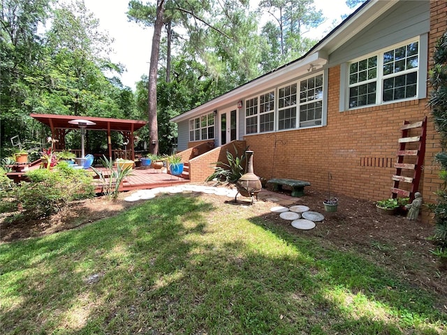 view of yard with a deck