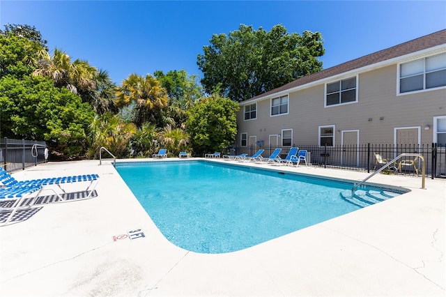 view of swimming pool featuring a patio