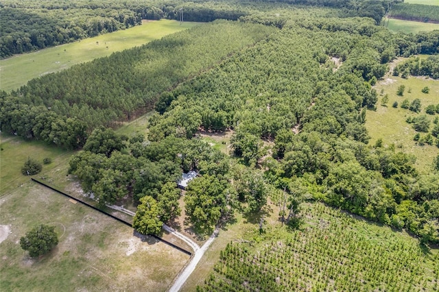 aerial view with a wooded view