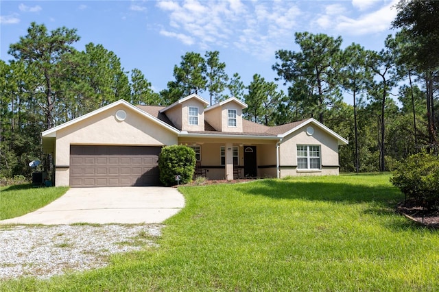 view of front facade featuring a front yard, a garage, and a porch