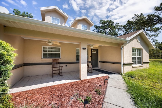 view of front of home featuring ceiling fan