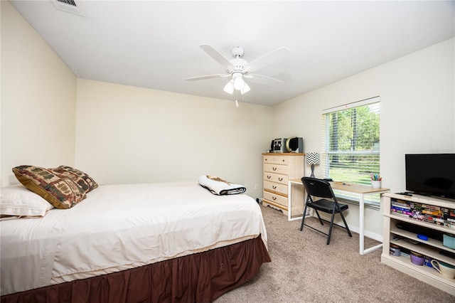 bedroom featuring ceiling fan and light colored carpet