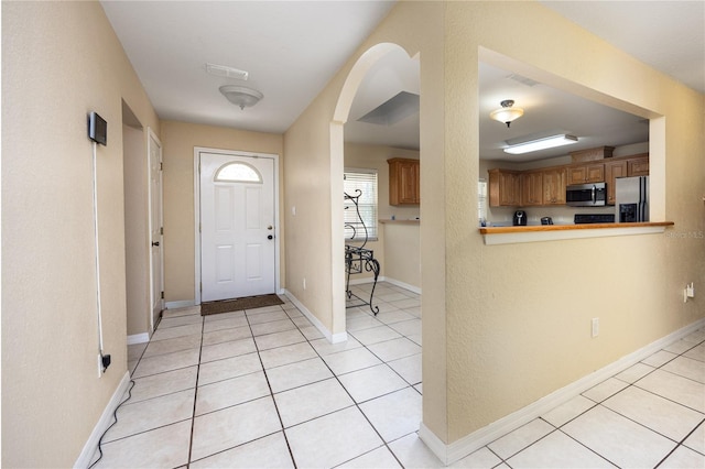 view of tiled foyer