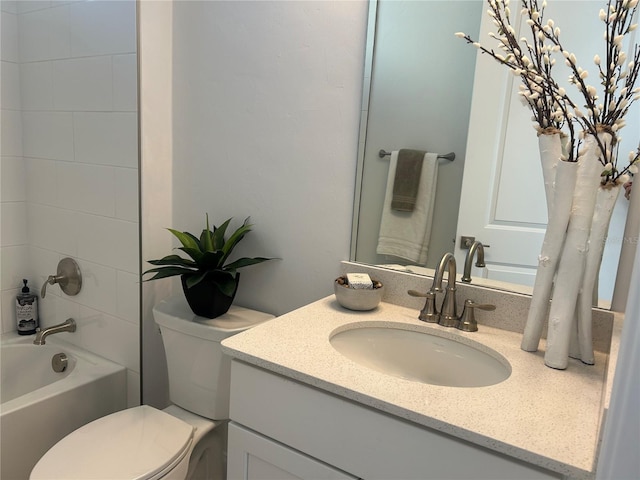 full bathroom with vanity, toilet, and tiled shower / bath