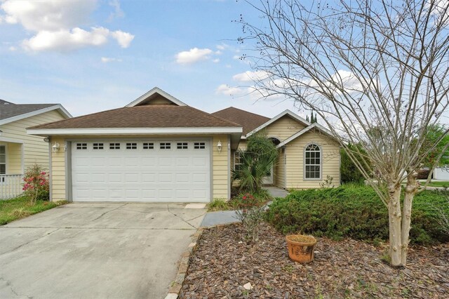 ranch-style home with a garage