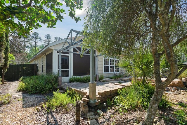 view of front of property with a patio