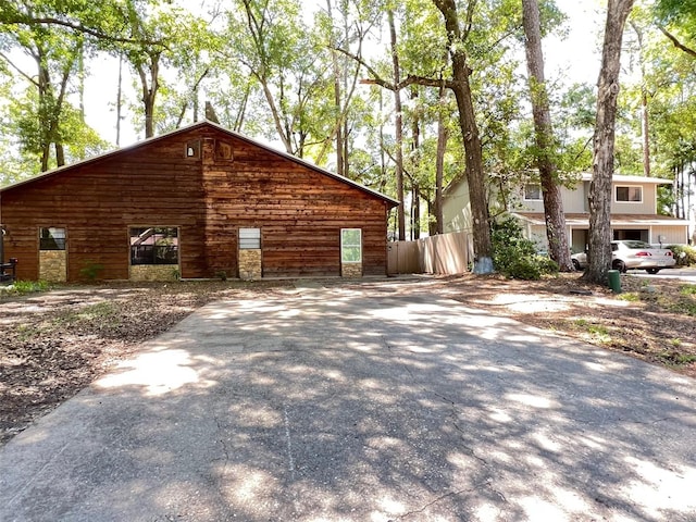 view of side of home with a garage