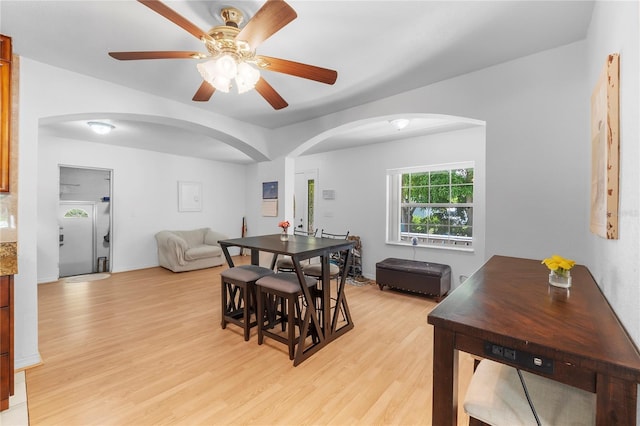 dining room with light wood-type flooring and ceiling fan