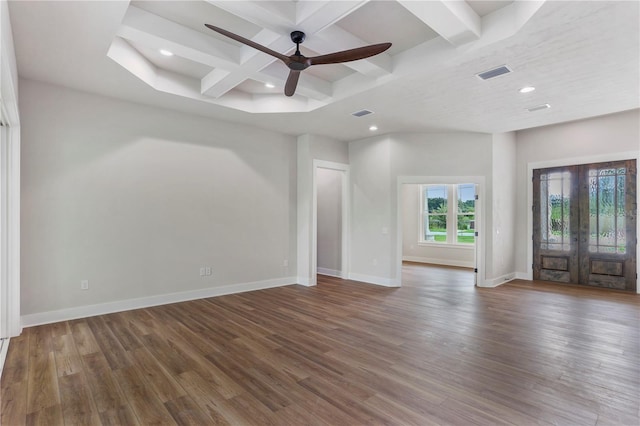 interior space with beam ceiling, ceiling fan, french doors, dark wood-type flooring, and coffered ceiling