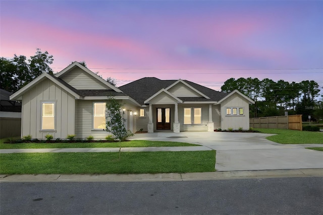 modern farmhouse featuring a lawn