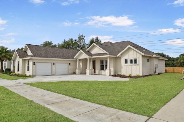 view of front facade featuring a garage and a front yard