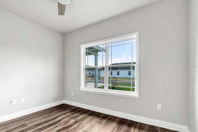 empty room with wood-type flooring and ceiling fan