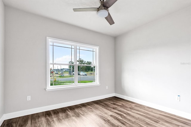 unfurnished room featuring ceiling fan and wood-type flooring