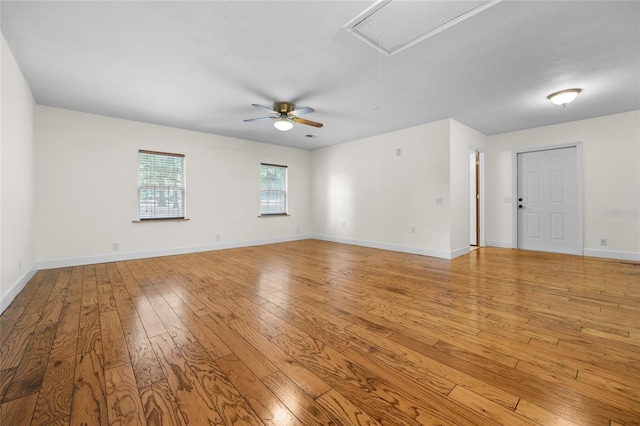 unfurnished room with ceiling fan and light hardwood / wood-style floors