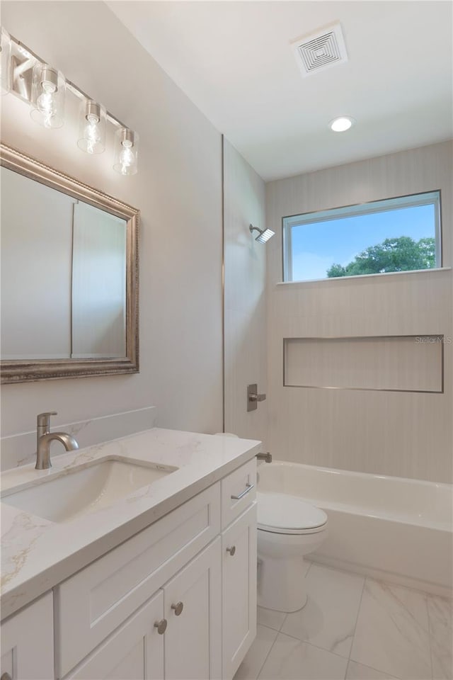 full bathroom featuring tub / shower combination, tile flooring, vanity, and toilet