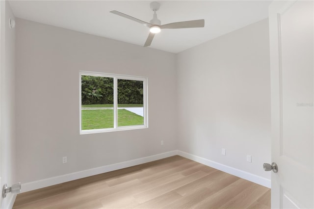 unfurnished room featuring ceiling fan and light wood-type flooring