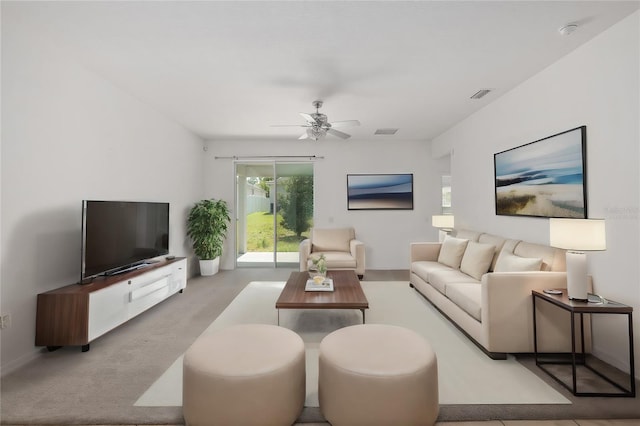 living room with carpet floors and ceiling fan