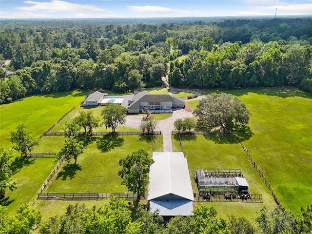 birds eye view of property featuring a rural view