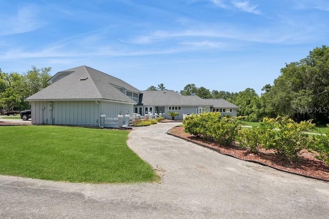 exterior space featuring a front lawn