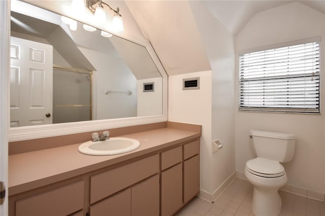 bathroom featuring tile patterned floors, lofted ceiling, toilet, a shower with door, and vanity