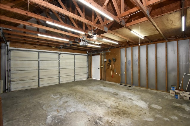 garage featuring a garage door opener