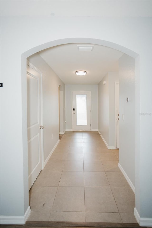 hall with light tile floors