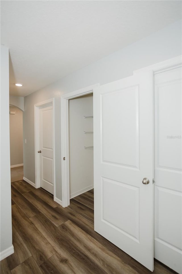 interior space with dark hardwood / wood-style flooring