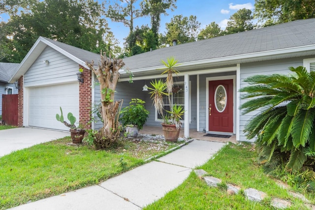 single story home featuring a garage