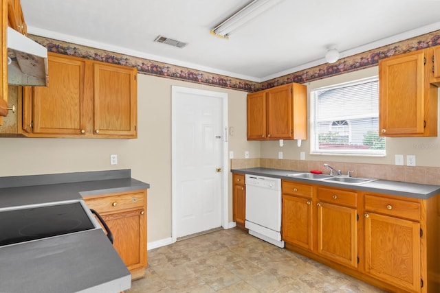 kitchen with white dishwasher, sink, light tile flooring, and range