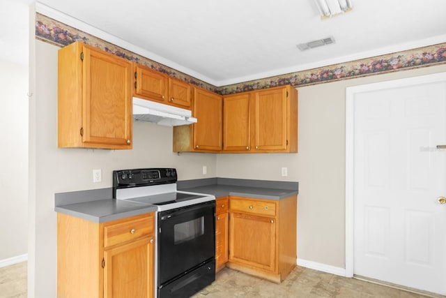 kitchen featuring black range with electric cooktop and light tile flooring