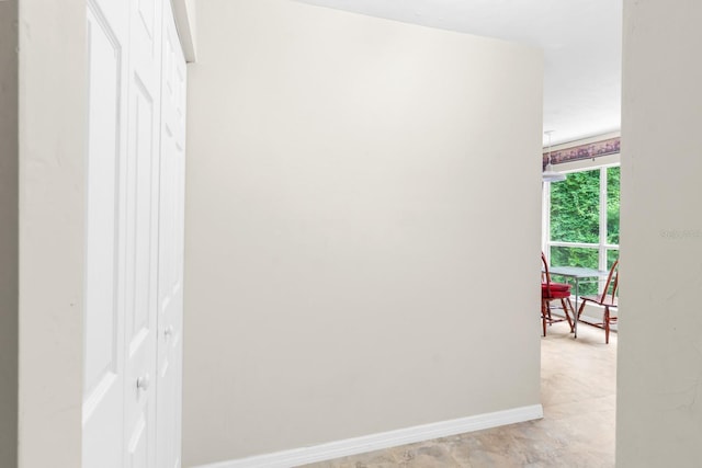 hall featuring tile flooring