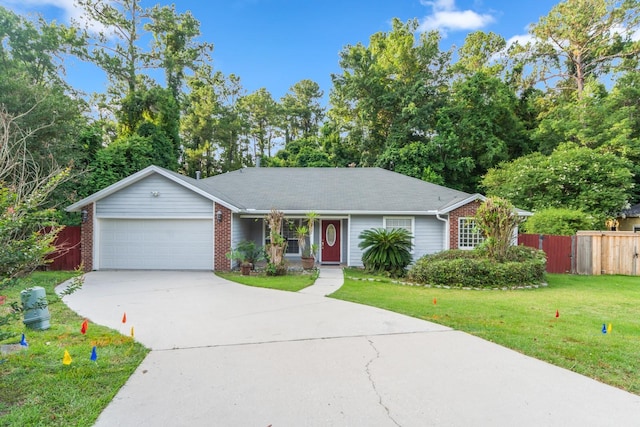 ranch-style home with a garage and a front yard