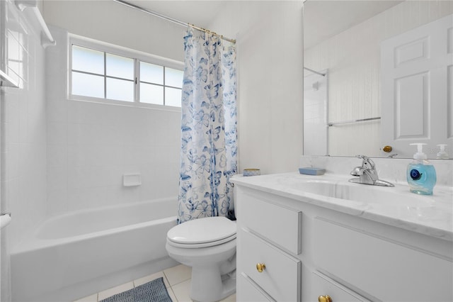 full bathroom featuring vanity, tile patterned floors, toilet, and shower / tub combo