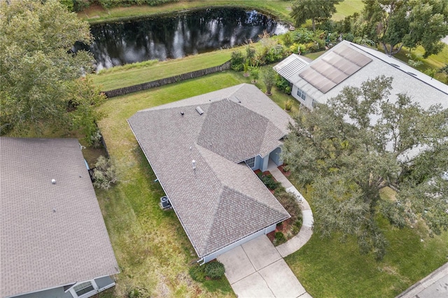 bird's eye view with a water view