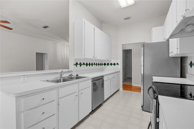 kitchen with dishwasher, white cabinets, sink, range with electric stovetop, and ceiling fan