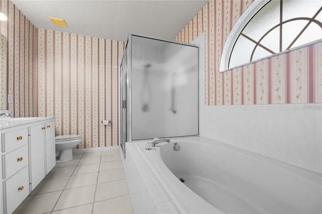 full bathroom with shower with separate bathtub, vanity, tile patterned floors, and toilet