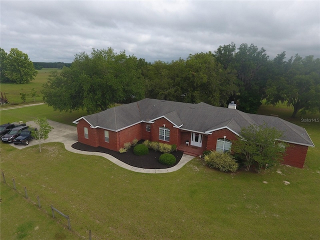 view of front of home with a front yard