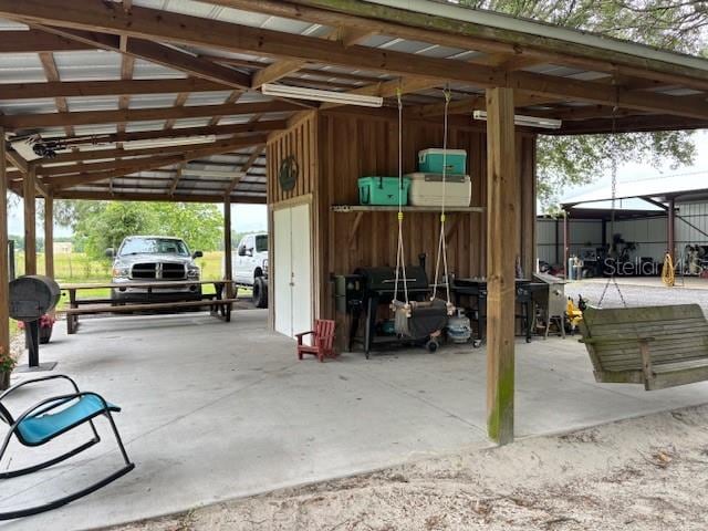 exterior space featuring a carport